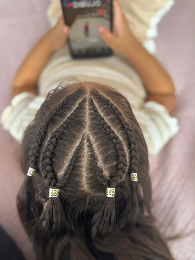 Cuatro trenzas con anillos
